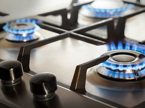 http://close%20up%20of%20gas%20burners%20on%20a%20stove