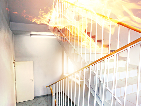 http://a%20fire%20spreading%20on%20a%20stair%20case%20inside%20a%20home